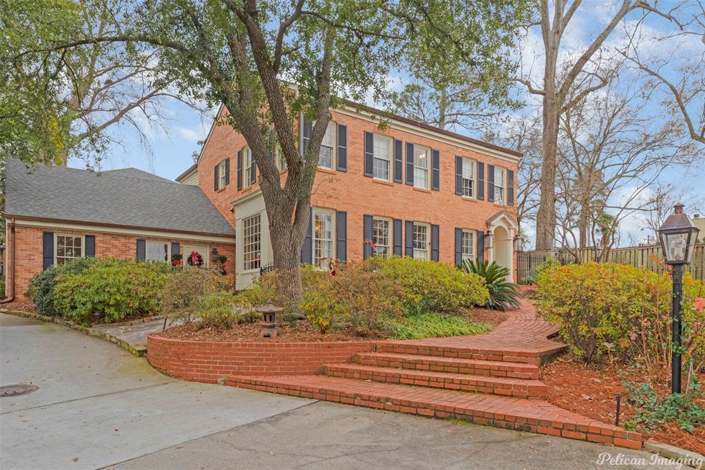 Elegant Brick home entirely remodeled, using the finest materials. A Soothing color palette. Seclude