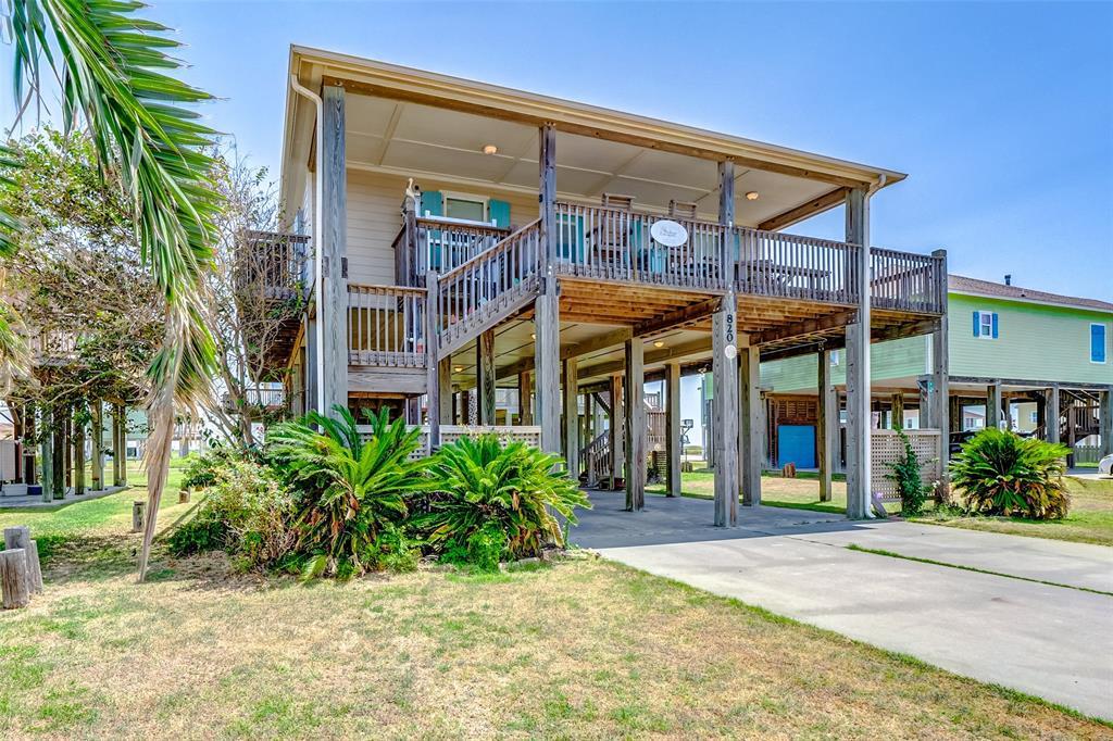 Enjoy all that Crystal Beach has to offer at your own beach house which can double as a vacation rental! Get ready to have fun in the sun! The home is close to shopping, entertainment and restaurants to round out the beach vibe. The downstairs is perfect for cleaning the catch of the day, cooking, playing games, music and chilling with friends. The golf cart garage creates added storage and the outdoor shower will feel great for a quick rinse off after kicking up sand all day. The cargo lift takes the load off as you head upstairs to this lovely 3 bedroom, 2 bath, very open concept home with a full laundry room. The kitchen has plenty of cabinet and counter space and the island is made for gathering. Wake up to the smell of salty ocean wate