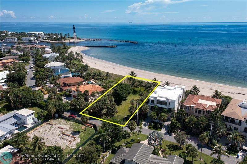OCEAN FRONT LOT! STUNNING PANORAMIC ENDLESS VIEWS OF THE OCEAN AND THE HILLSBORO LIGHTHOUSE! BUILD YOUR DREAM HOME & LIVE THE FLORIDA LIFESTYLE. This is an amazing and rare opportunity to own one of the last remaining oceanfront parcels in the heart of Hillsboro Shores, a small upscale beachfront community with exclusive private beach access. Spectacular views of the Lighthouse. Relax and enjoy your privacy while watching the constant boat action all year long through the Hillsboro Inlet making this spot a magnificent location. The lot measurements are approx 85 ft (street) x 234 ft x 227 ft x 67 ft (oceanfront) SURVEY IN ATTACHMENTS.