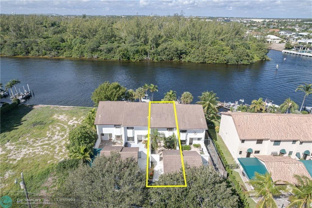 Waterfront townhouse w/ 2Beds/2.5Baths/1CG, Deeded water access, private gated courtyard & steps to Deerfield Pier & beach. Enjoy endless views of the ICW & Deerfield Nature Preserve. 1st Floor: Living/Dining Room, office, half bath and sliders for great natural light & full Intracoastal views! Updated kitchen w/ marble counters, stainless appliances, shaker cabinets, great storage, 9ft breakfast bar & picture window. Guest bath & Laundry also on 1st floor. Upstairs Master w/vaulted ceilings, high-hat lighting, built in closets, private balcony & full water views. Master Bath offers double vanity, travertine walk in shower, soaking tub, marble floors & linen closet. Second Bed & Bath features bay window, walk in closet, vaulted ceilings & w