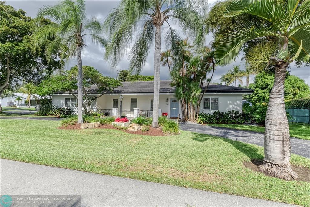 WOW! CHARMING and UPDATED North PALMETTO BAY 4 BR / 2 Bath POOL home on a very PRIVATE 15,000 sf CORNER lot. NEWER Flat Tile Roof (2019), IMPACT GLASS windows (2020) and doors with a couple exceptions. OPEN layout with WOOD and TILE floors in the main living areas. LIGHT and BRIGHT Kitchen includes QUARTZ Countertops, ISLAND with Cooktop and STAINLESS STEEL appliances. Family Room has a beautiful wood burning FIREPLACE and French doors to the lovely Screened KEYSTONE PATIO with Pool and outdoor bar area, perfect for entertaining! LUSHLY Landscaped SECLUDED back yard with a FIRE PIT. Large side yard, with wide gates, room for your boat! Must see to appreciate. HURRY, will not last.