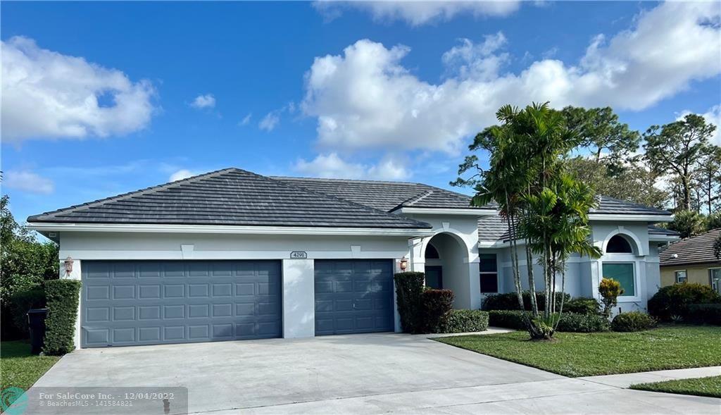 One of the most sought-after locations in western Lake Worth.  The home features over just over 2700 sq feet.  BRAND NEW ROOF 11/22.  The home has volume ceilings with a large living room & dining area, eat in kitchen w/ island & family room.  Split bedroom plans allow privacy for everyone.  3 car garage with storage space.  The large primary bedroom features two walk in closets and a large dressing room lined with shelves.  Dream storage for your shoes and clothes.  remodeled primary bathroom features separate vanities, walk in shower, stand-alone tub, new tile, fixtures & mirrors.  The other two bathrooms have been updated with great style. Freshly painted exterior, Impact windows.  Large lot w/ pool for entertaining. great schools. commu