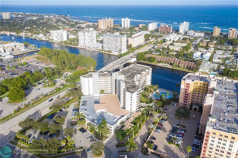 READY FOR NEXT SEASON AT THE VOYAGER! The most popular 2 Pet friendly building in Pompano Beach. Spacious 982 sq ft, 1b/1.5b condo with a Covered garage parking space and 24hr Security Guard. Incredible direct views on the Intracoastal Waterway with coveted southeast breezes from your open balcony overlooking the resort like pool/BBQ/lounging area. Inside washer/dryer. Secure lobby with 24-hour guard. Fitness center. Club room. It's a vacation vibe every day! Close to all the new exciting Pompano Beach development now occurring with the New Pier now open, new upscale restaurants, retail shopping, city Tennis & Pickle Ball courts, Amphitheatre and the Greg Norman golf course nearby. Also located across from the Boat Launch Park where you can