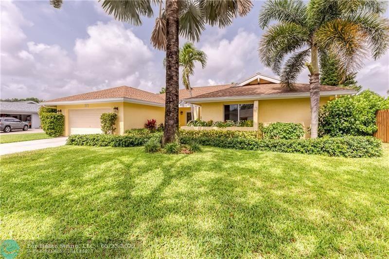 Sought After Location in Boca Raton! This 4 Bedroom Room 2-1/2 Bath Home is Located in Strathmoore (Boca Madera). The moment you walk in the Foyer of this home & see the Vaulted Ceilings with the corner Sliders that lead out to your Enclosed Pool To Your Tropical Garden you will not want to leave.The Bamboo flooring in the home is beautiful. You have a Wood Burning Fireplace to set Back and Relax.The Kitchen has new Stainless Appliances, Granite Counter Tops, Large Pantry w/Pull Out Shelving, Lazy Susan, Pass Thru Kitchen Windows for Entertaining your Guests. The 4th Bedrm has a Wet Bar that is presently being used as Office/Den. It can be turned back into a Bedrm. 2 Car Gar, Hurricane Impact,Wired for Generator Hook up 7500 Watt, Inside La