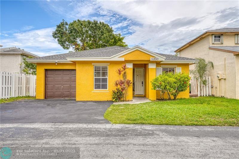 Photo of 5890 Woodland Point Dr in Tamarac, FL