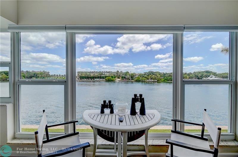 Direct Intracoastal 2 bedroom, 2 bathroom unit , enjoy the daily boat parade right in front of your windows. This beautiful updated unit is located right next to the Lighthouse Point Marina, the Nauti Dawg Restaurant, and only a short walk to the dock where you can catch the boat to Cap's Place Restaurant. Lighthouse Colony is a small and well maintained complex with only 44 units, overlooking the Intracoastal, Hillsboro Inlet and the most expensive homes in Broward County. There is a private marina at the complex (privately owned slips), currently there is two slips offered for rent to Lighthouse Colony residents. There is also a club house with a pool, and ample guest parking. Impact windows, new appliances.