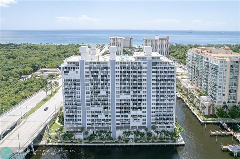 NEW IMPACT WINDOWS AND DOORS TO BE INSTALLED AND TOTALLY PAID FOR BY THE SELLER** PRIME Sunrise Intracoastal WATERFRONT LOCATION. Yacht level views day & night! Boutique GATED building. Semi private foyer entrance, immaculately maintained 1 bed 2 bath condo ready for new owners to make it their own. Bright east west flow thru unit, Spacious rooms, in home W/D, private trash chute, Parquet wood floors, and private balcony overlooking the water. Amenities include heated ROOFTOP POOL / Deck, 2 updated gyms and clubroom – all with expansive panoramic views, drop off dockage for guests, BBQ grill, covered pet park on ground level, gorgeous new lobby, 24hr security, GARAGE PARKING. Pets up to 25#. Close to beach, park, fine dining. Nightlife & sh
