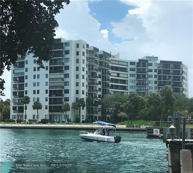 Large 1000+SF garden 1st floor 1 bedroom 1.5 bath unit just steps from the Intracoastal. Perfect unit if you don't like elevators with garage parking also on 1st floor. The large Eat-In Kitchen opens onto the dining area. Large Bedroom has 12’ of Closets on both sides of the hallway to your en-suite bathroom. Guest Half-Bath. Laundry in unit! No popcorn, A/C 6/2018 & water heater 1/2020.This building has fire sprinkler system! Most sought after building on the West side of the Intracoastal so no waiting on the bridge. 24/7 security, magnificent resort style heated pool located on water's edge. Located 2 short blocks to the beach, near restaurants, shopping, entertainment, boat ramp next door, golf, just 25 minutes to FLL airport. PET FRIEND
