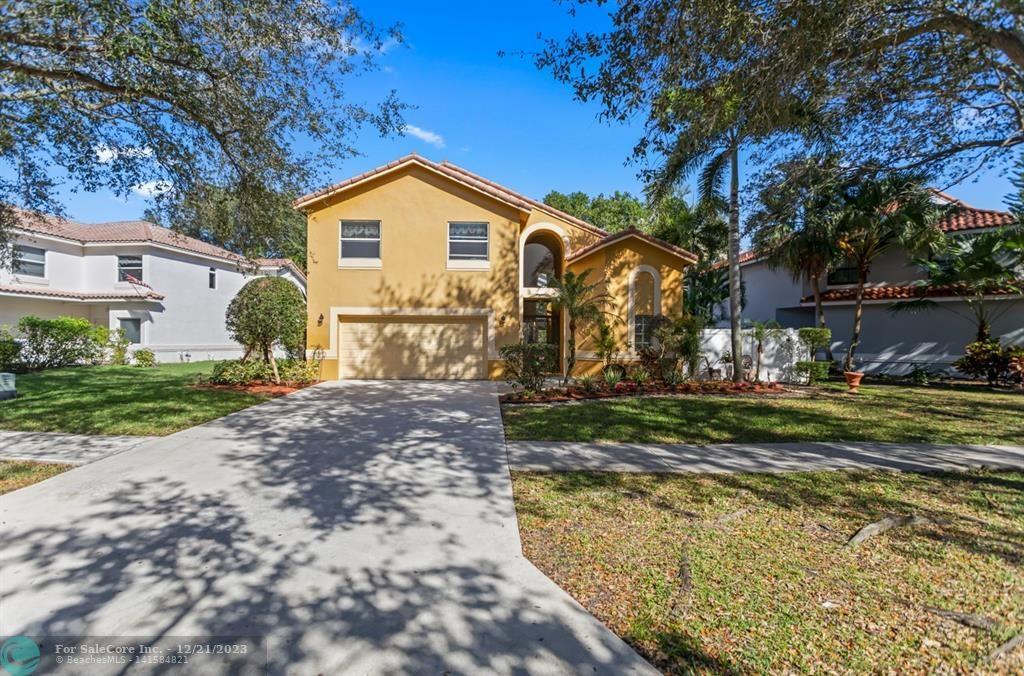 Photo of 5721 NW 60th Pl in Parkland, FL