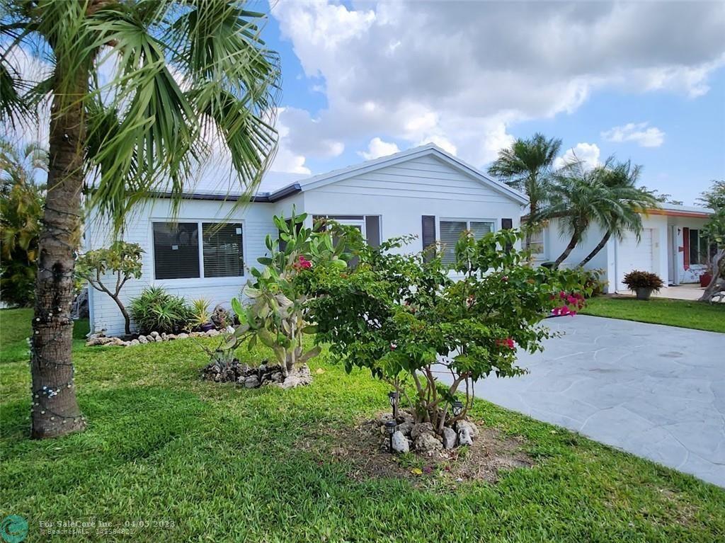 Photo of 8103 NW 58 Pl in Tamarac, FL