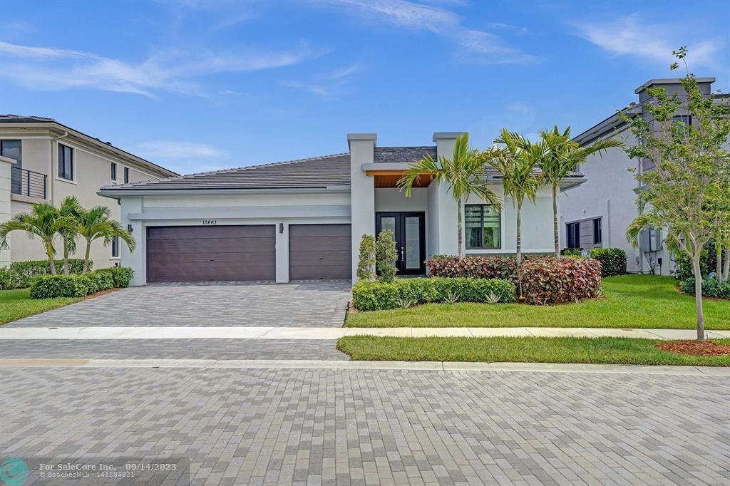 Photo of 10663 N Lago Vista Cir in Parkland, FL
