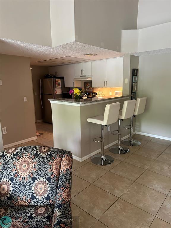 Photo of 5015 Wiles Rd 201 in Coconut Creek, FL