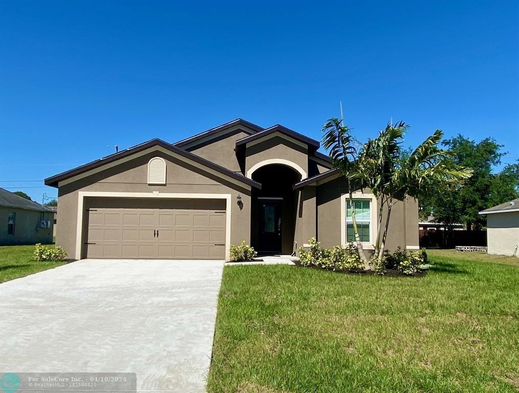 Photo of 1299 SW Heather St in Port St Lucie, FL