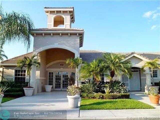 Photo of 5035 Wiles Rd 105 in Coconut Creek, FL