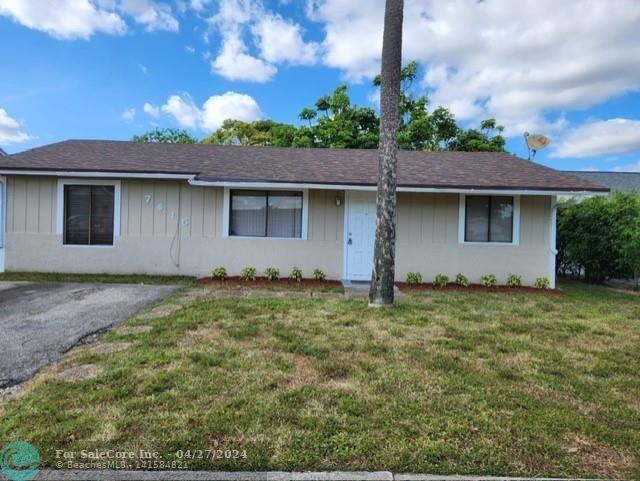 Photo of 7615 SW 8th Ct in North Lauderdale, FL