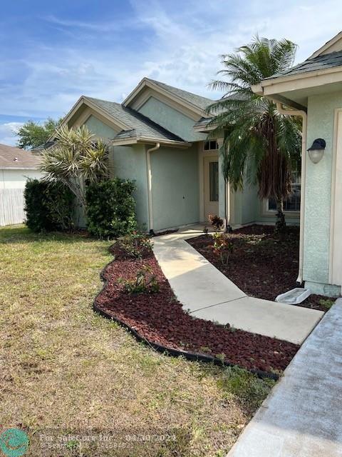 Photo of 1882 SW Inlander Ave in Port St Lucie, FL