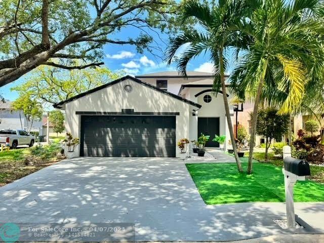 Photo of 3851 NW 23rd Pl in Coconut Creek, FL