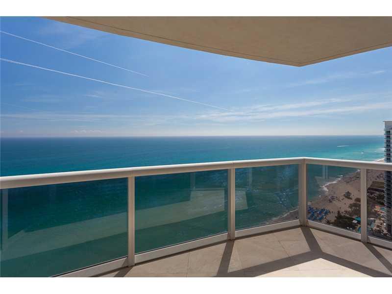 BEST PRICED DESIGNER UNIT ON THE BEACH, WITH STUNNING VIEWS TO THE OCEAN & INTRACOASTAL, COMPLETELY 