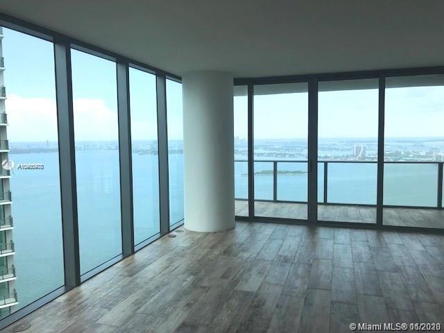 Beautiful Bay views from this spacious and comfortable 1 BED + DEN/2 BATH condo at luxurious Paraiso