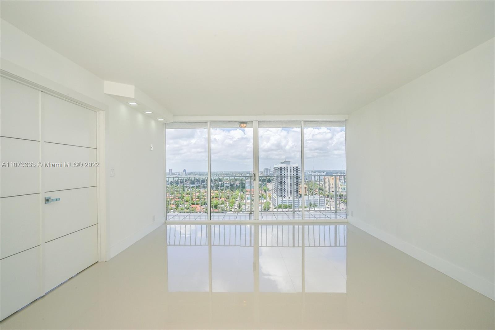 Beautiful designer's dream 2/2 condo, with 24x24 Italian imported rectified porcelain throughout, an