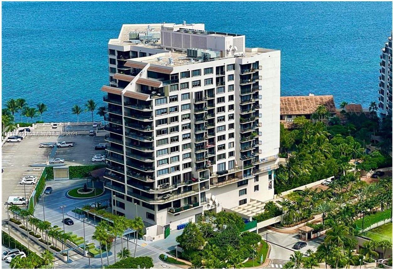Beautiful and spacious 1 bed 1.5 bath with breathtaking water view in luxurious Brickell Key II Cond