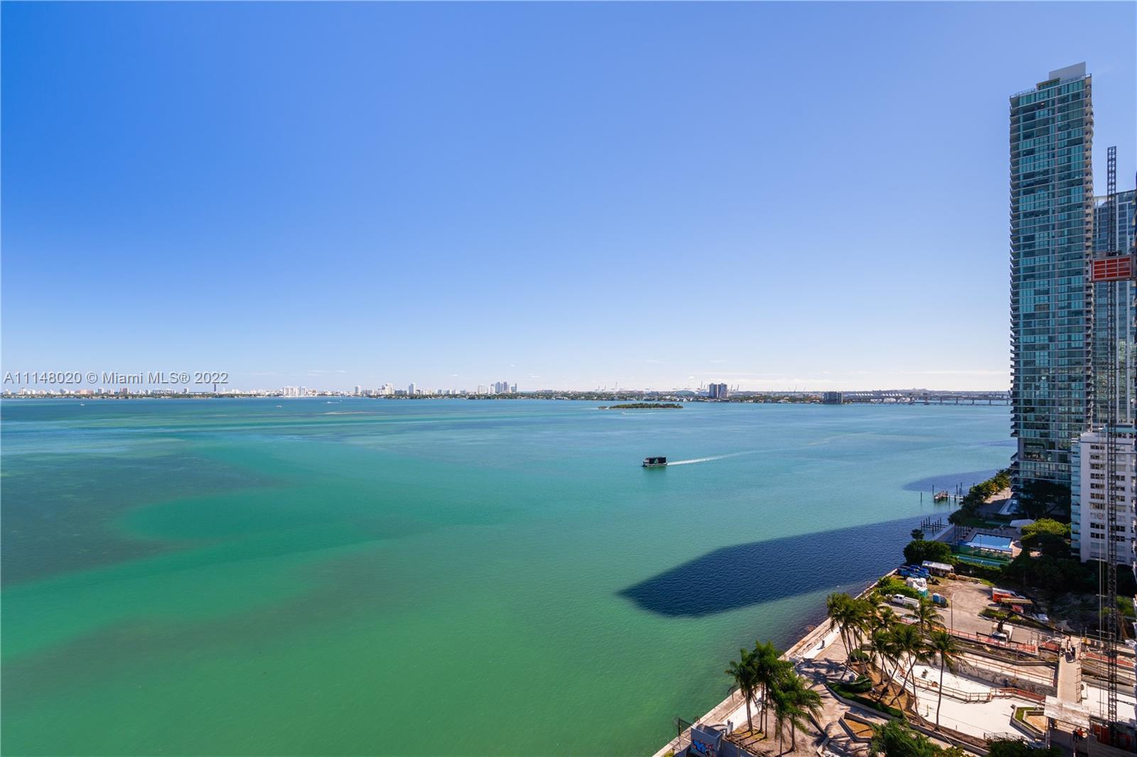 Wake up in this spacious 1/1.5 to sunrise ocean views overlooking cruise ships, Biscayne Bay, and So