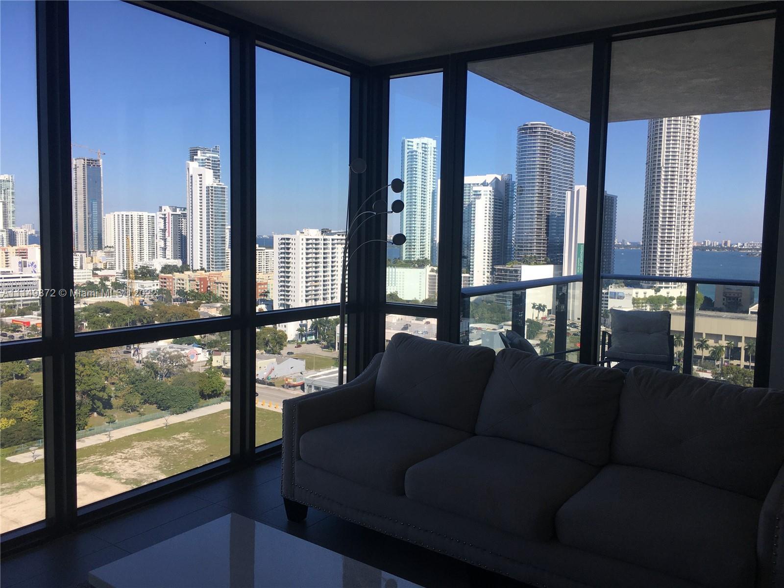 MAGNIFICENT UNOBSTRUCTED WATER VIEWS FROM ALL ROOMS IN THIS LUXURIOUS 2 BEDROOM 2 BATH IN THE HEART 