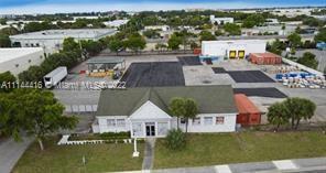 PRIME LOCATION - BEST DEAL EVER !!! Approximately 2 1/2 acres w/2 buildings totaling 7500 SQ FT & Re