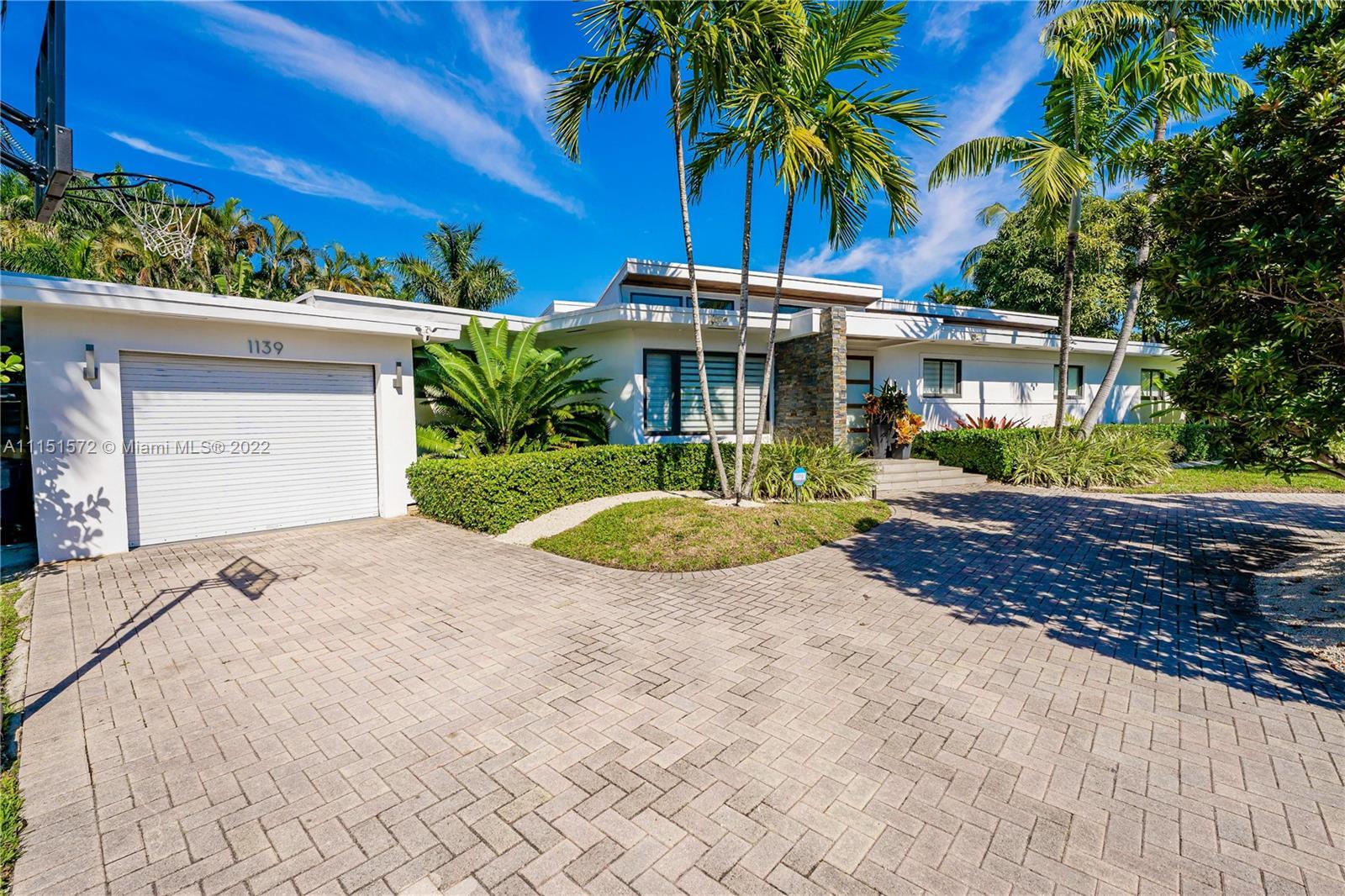 MID CENTURY MODERN GEM IN MIAMI SHORES. A luminous and spacious home with 2,385 SF of total living s