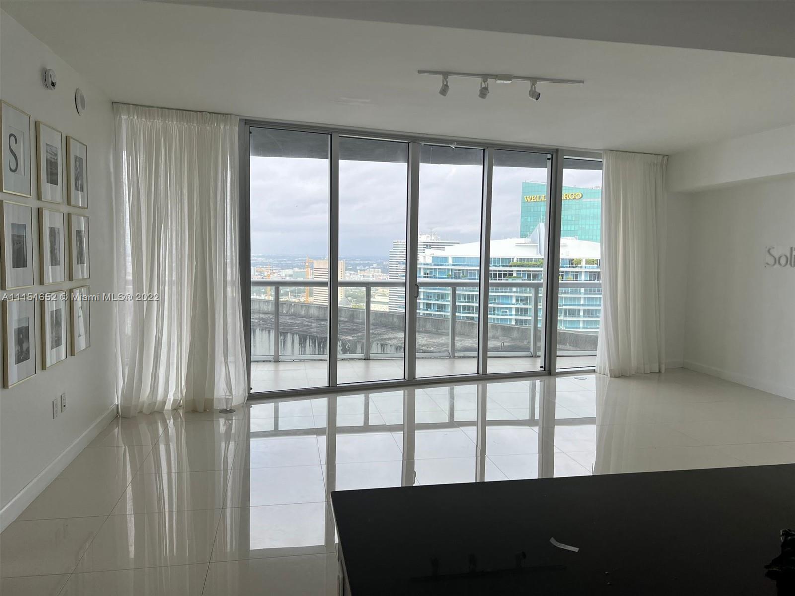 OWNER WILL ENJOY THE MIAMI LIFE FROM THIS SPACIOUS APARTMENT. UNIT FEATURES PORCELAIN FLOOR THROUGHO