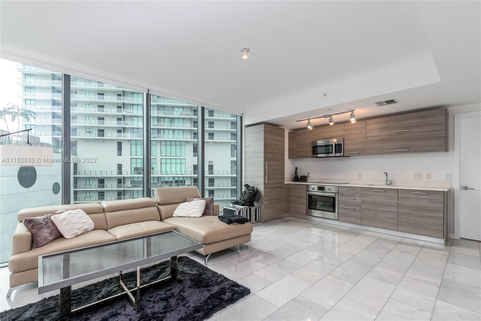 Beautiful corner residence with an abundance of natural light at Paraiso Bay in Edgewater. This 1 be