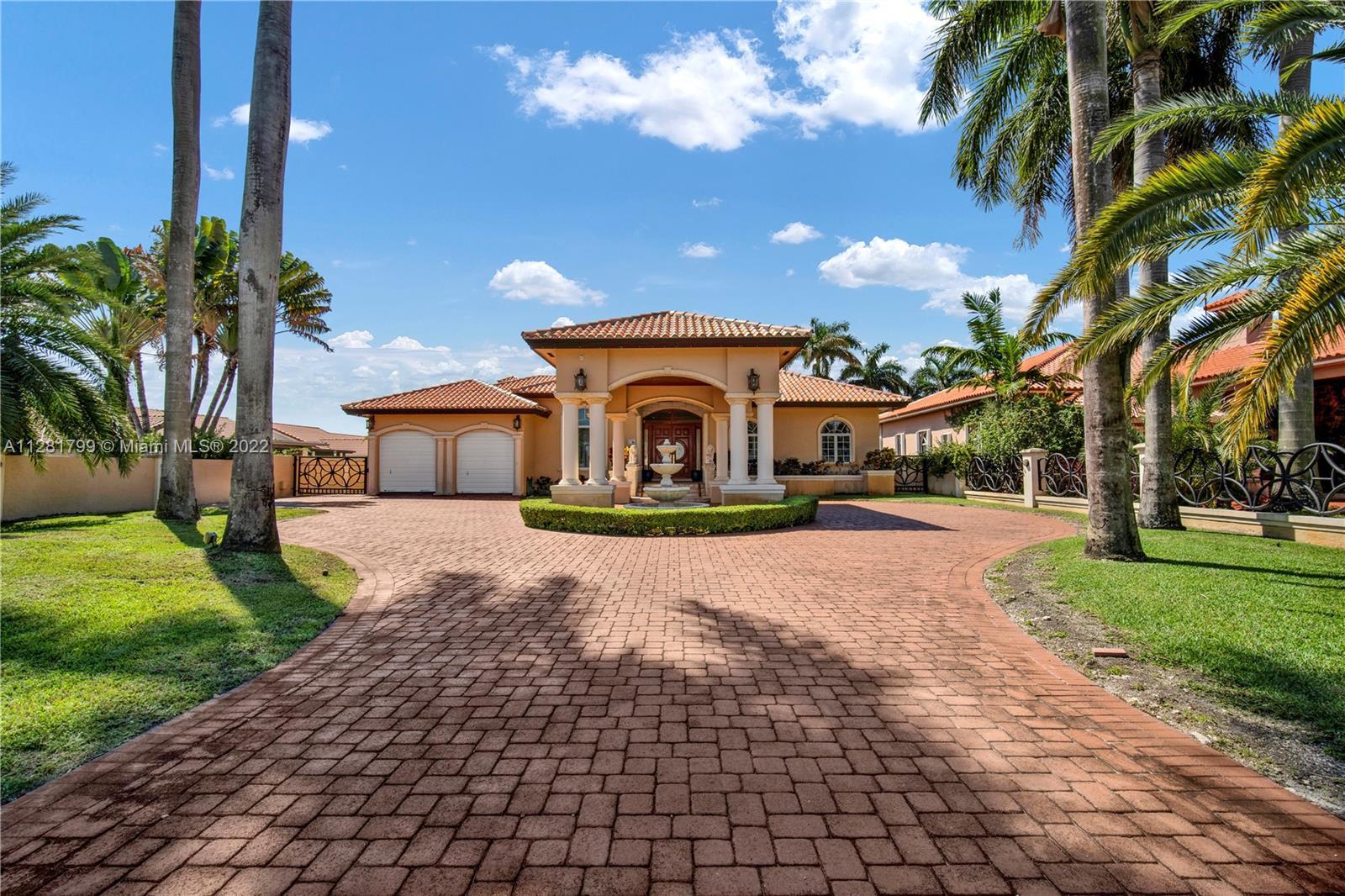 Euro-Spanish custom built Estate: In the heart of Miami, this prime half acre lot offers charming gr