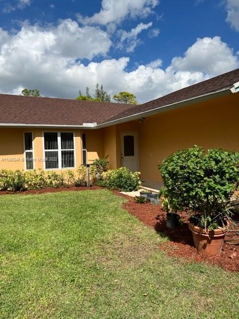 Great starter home or investment property. Set on 1.29 acres beautifully landscaped with mature ficu
