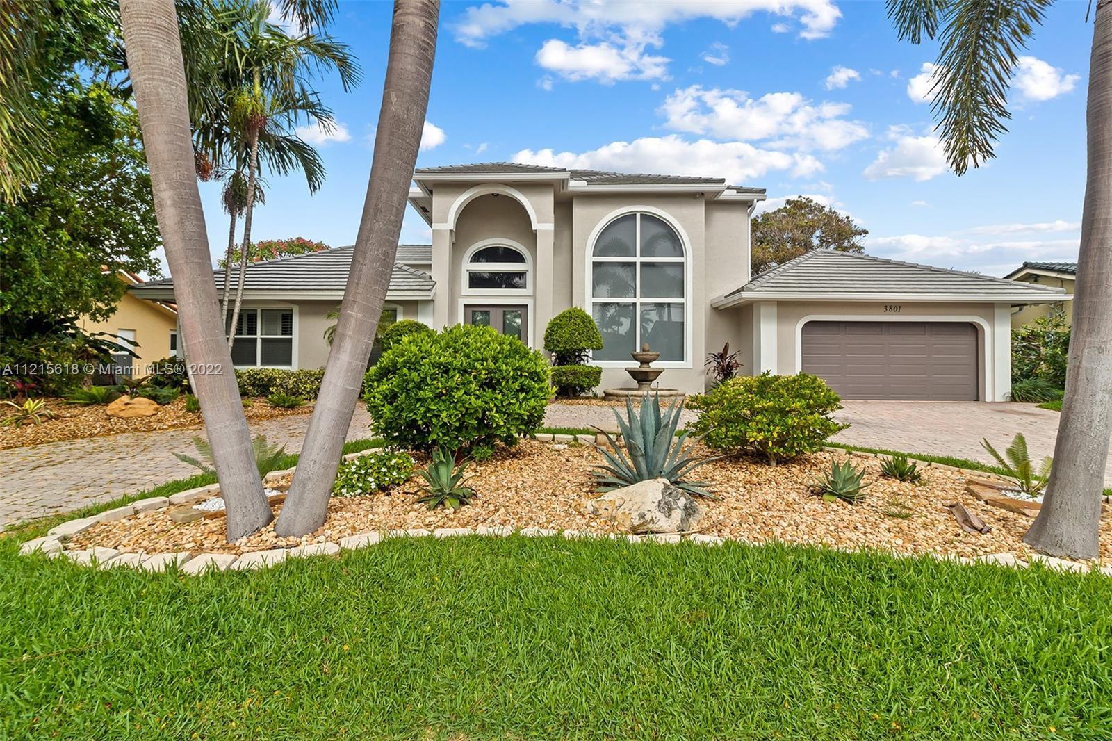 Grand waterfront estate in Venetian Isles. Located on 90' of deep water access and no fixed bridges.