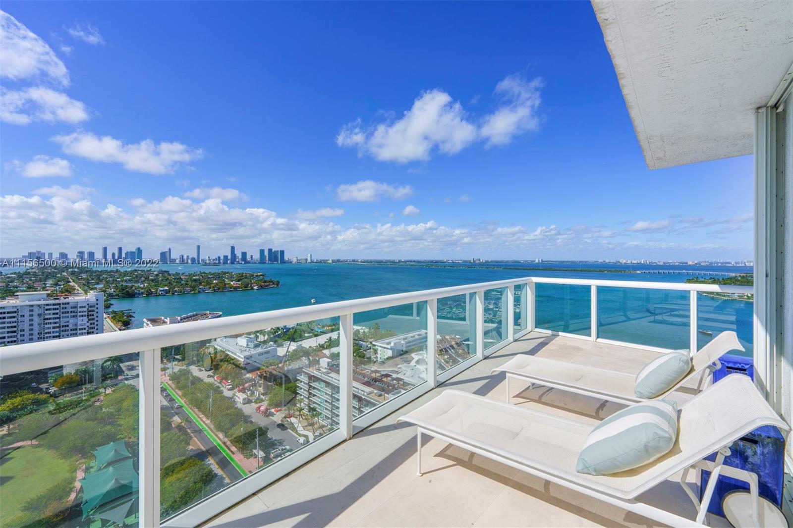Miami stretches out before you from this one-of-a-kind PH Duplex on coveted Belle Isle. Sweeping vie