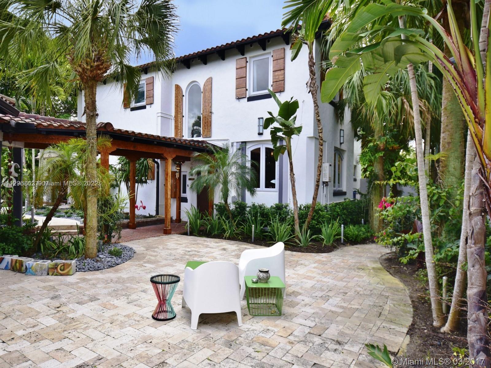PRIVATE AND HIDDEN OASIS in glamorous Miami Shores! Restored and remodeled Old Spanish-style luxury 