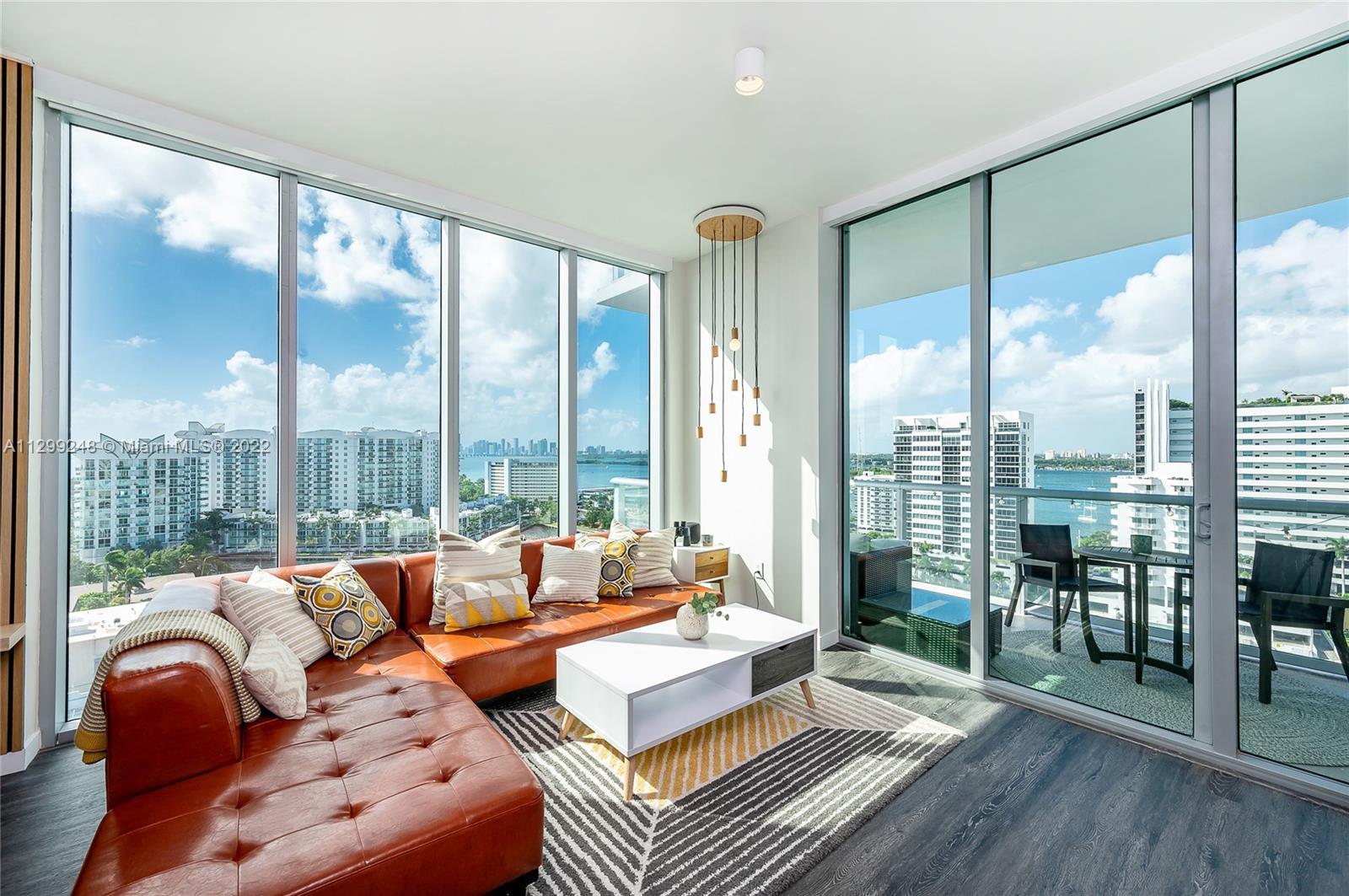 Stunning rarely available corner unit overlooking Biscayne Bay! Enjoy sunsets, Miami skyline, & wate