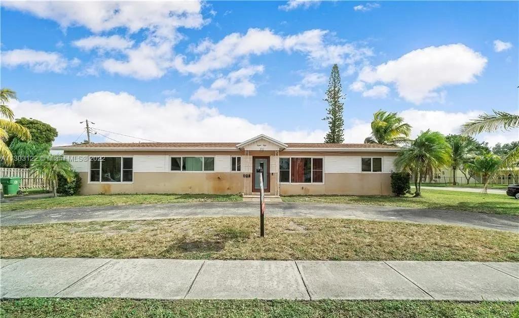 Beautiful home located on a large corner lot with a fence in the backyard. A 4 bedroom 2 bathroom ho
