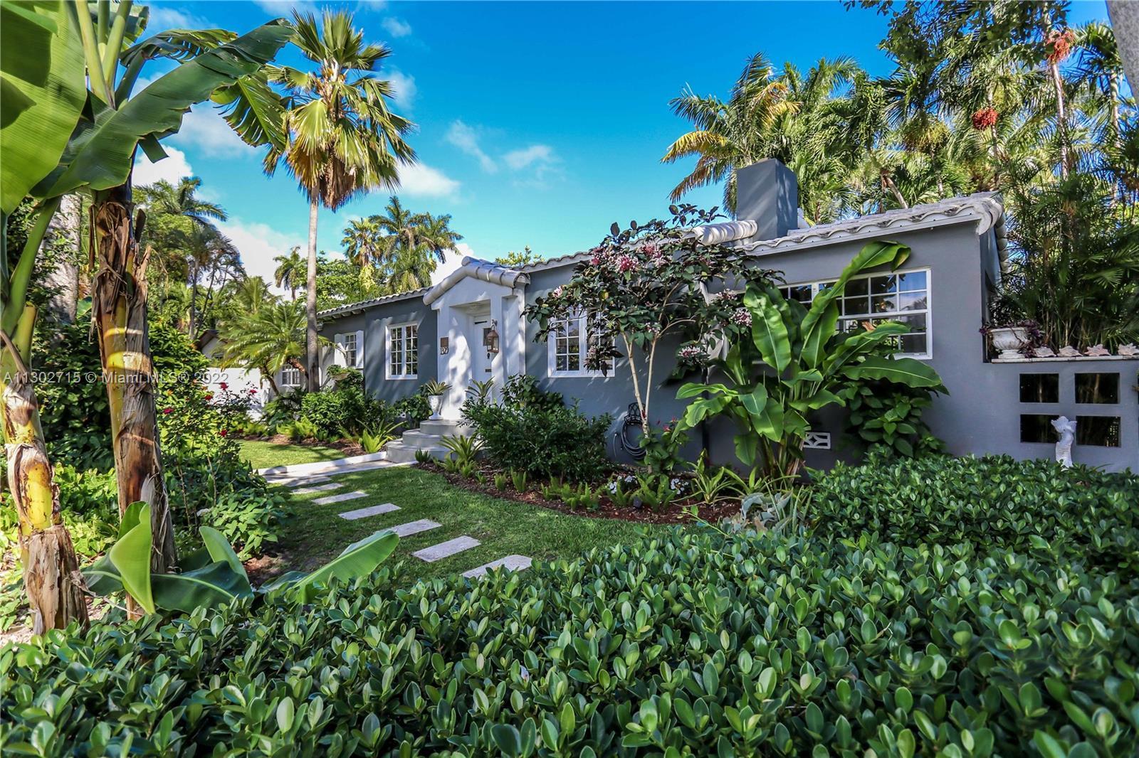 WELCOME YOUR TROPICAL OASIS IN THE HEART OF HOLLYWOOD LAKES! THIS JEWEL OF A HOME FEATURES A TOTAL O