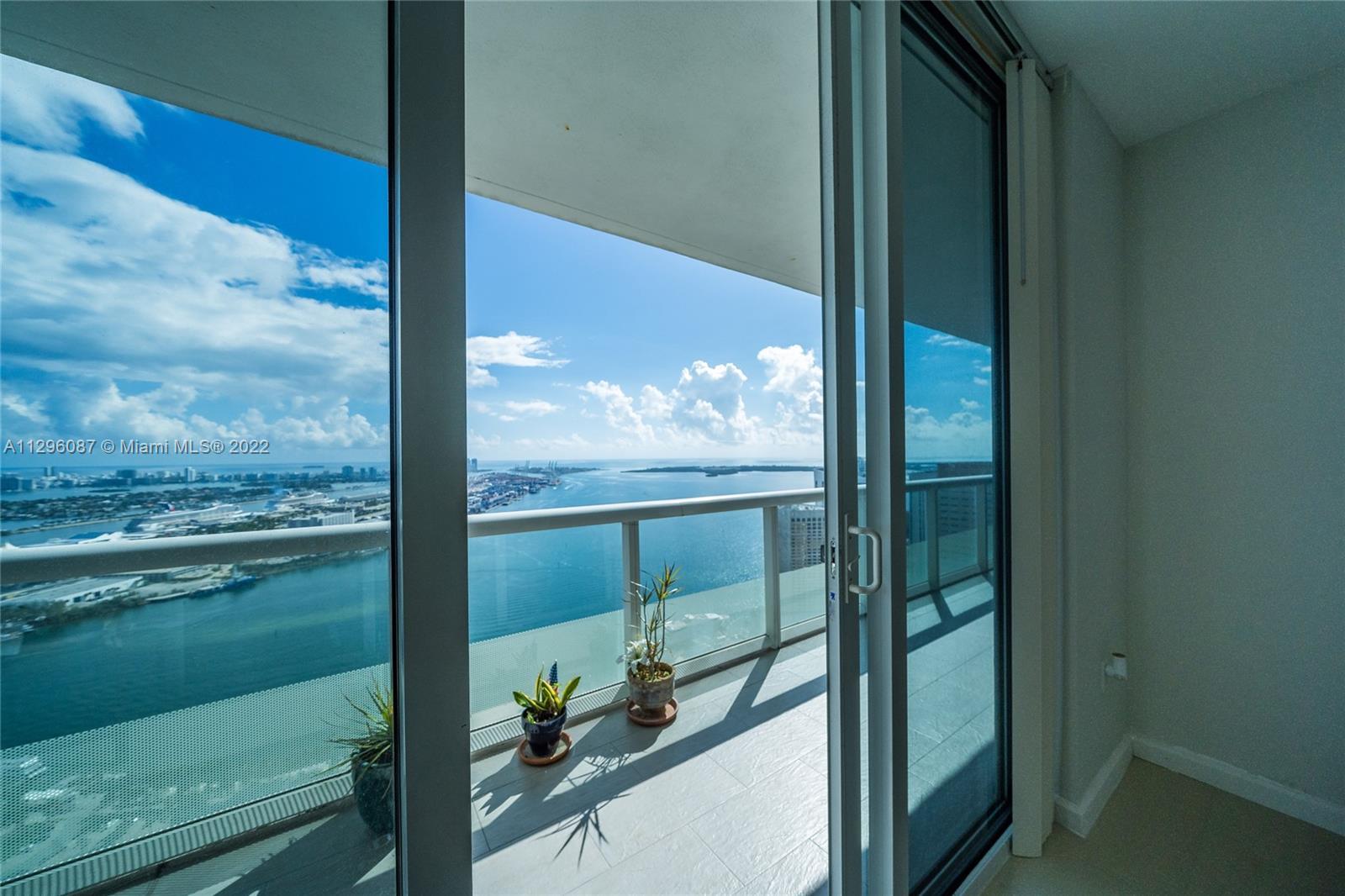 Gorgeous unobstructed 52nd floor unit with amazing views of (cruise ships, bay, evening skyline & su