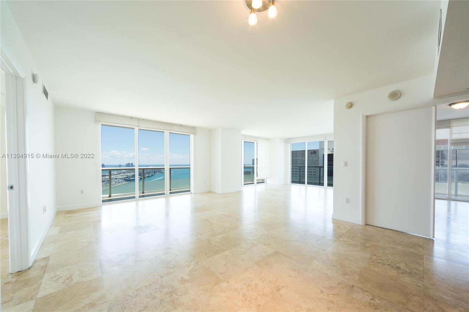 Beautiful three-bed, two-bath luxury condominium in the heart of downtown Miami with direct views of