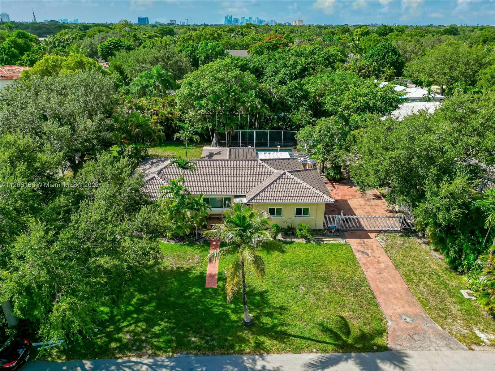 This amazing home awaits you in this friendly neighborhood of  Miami Shores ! BEAUTIFUL CORNER DOUBL