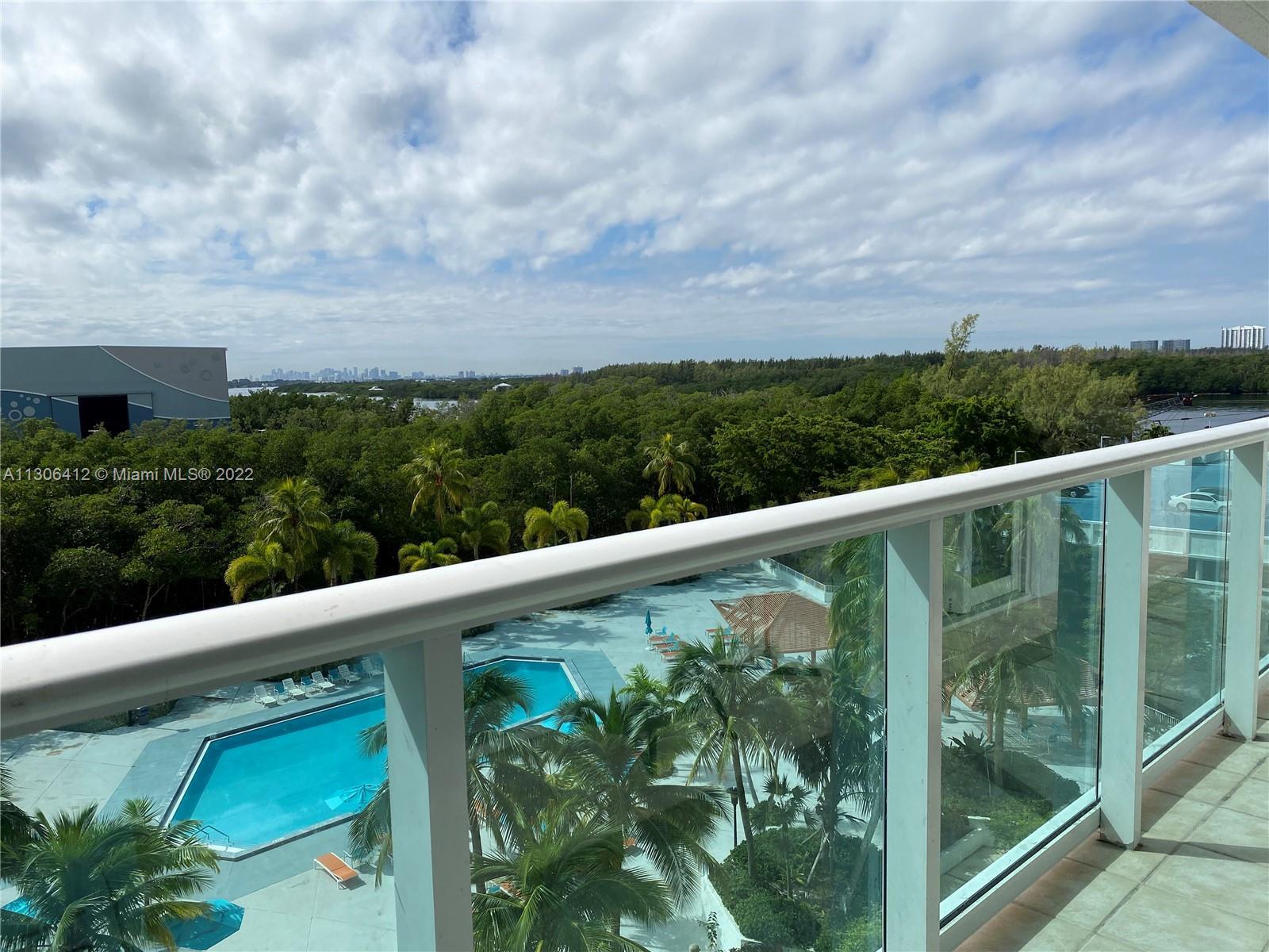 RENOVATED UNIT WITH BRAND NEW VINYL FLOORS THROUGHOUT THE UNIT AND VIEWS OF THE POOL AND INTRACOASTA