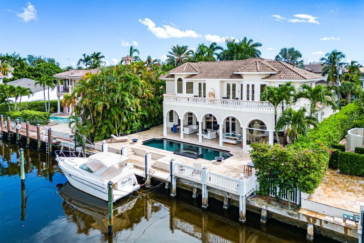 Remarkable 5 bedroom, 2 story waterfront home in Boca Raton’s esteemed Lake Rogers community. This s