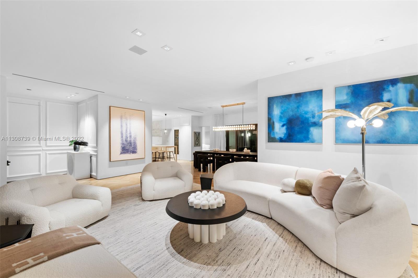 Live on Miami Beach’s prestigious Lower North Bay Road in this impeccably designed 4 bedroom + priva