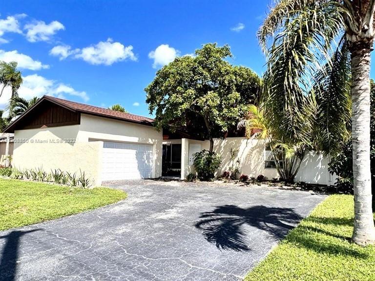 This newly renovated home is in the beautiful Gates Of Hillsboro community in Deerfield Beach.  It i