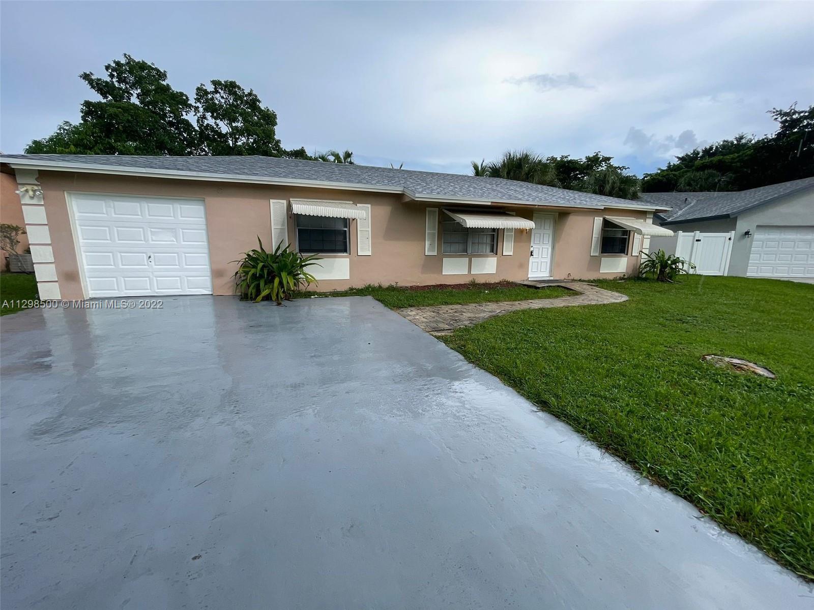 A MUST SEE AND WILL NOT LAST LONG. THIS 3/2 SINGLE FAMILY IS CENTRALLY LOCATED IN THE HEART OF BOCA 