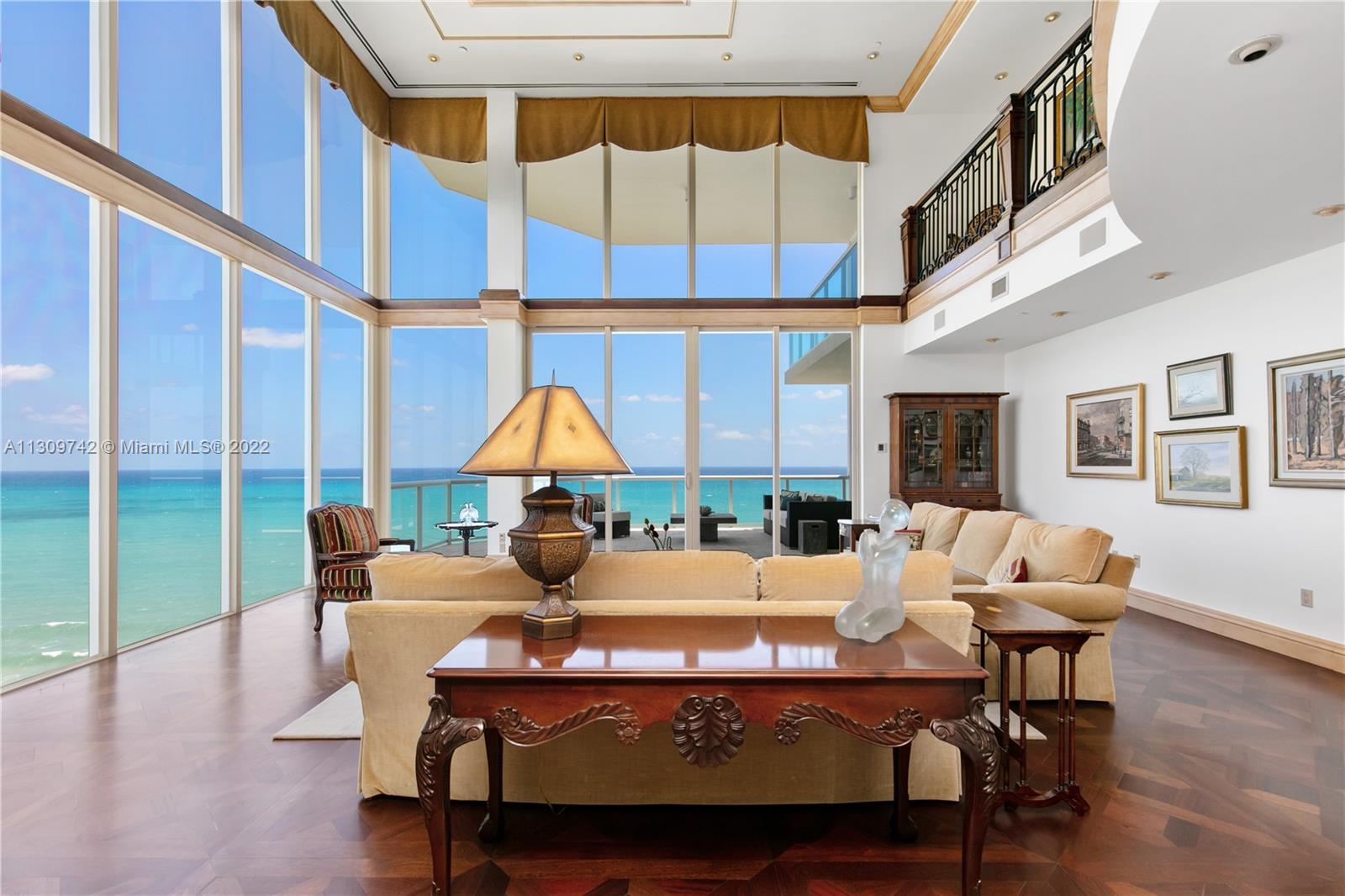 Magnificent 2-story, one-of-a-kind, beachfront penthouse unit located right on Hollywood Beach! Huge