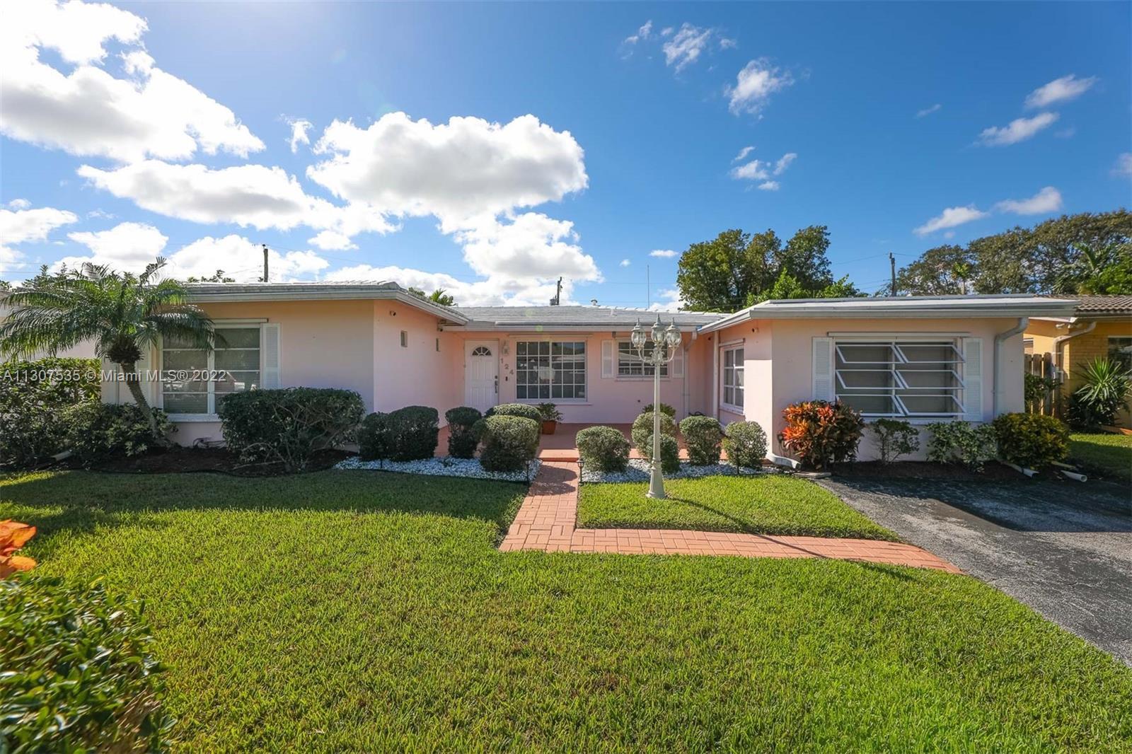 Tucked Away on A Quiet Street in One of Wilton Manors' Most Sought Out Neighborhoods.  This Lovely H
