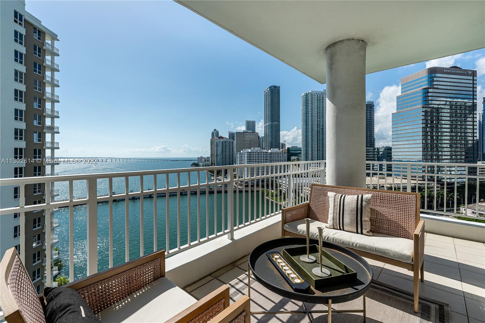 Spectacular corner unit with beautiful views of the bay, river, and Miami Skyline. Designer furnishe